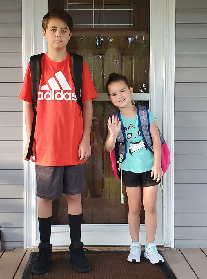 My kindergartner and 6th grader...2 big milestones!!.jpg
